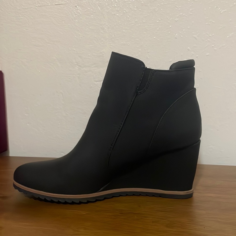 Womens Booties. Black. Wedge heel. Size 8. Never worn. 2-3/4” heel.